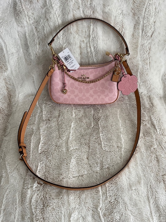 Coach Handbags - Coach Teri Shoulder Bag In Signature Canvas With Charms. Powder pink/ Gold